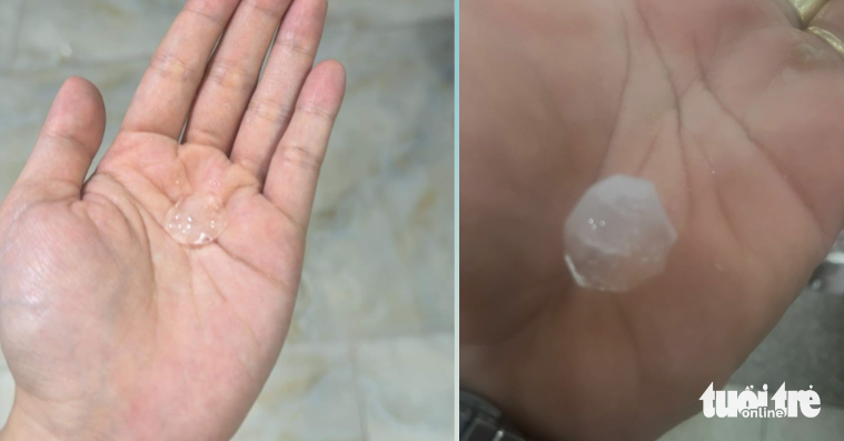 Chiều nay mưa lớn, TP.HCM, Bình Dương xuất hiện mưa đá- Ảnh 1. Những viên đá được người dân nhặt ở TP.HCM trong trận mưa chiều nay - Ảnh: T.T.